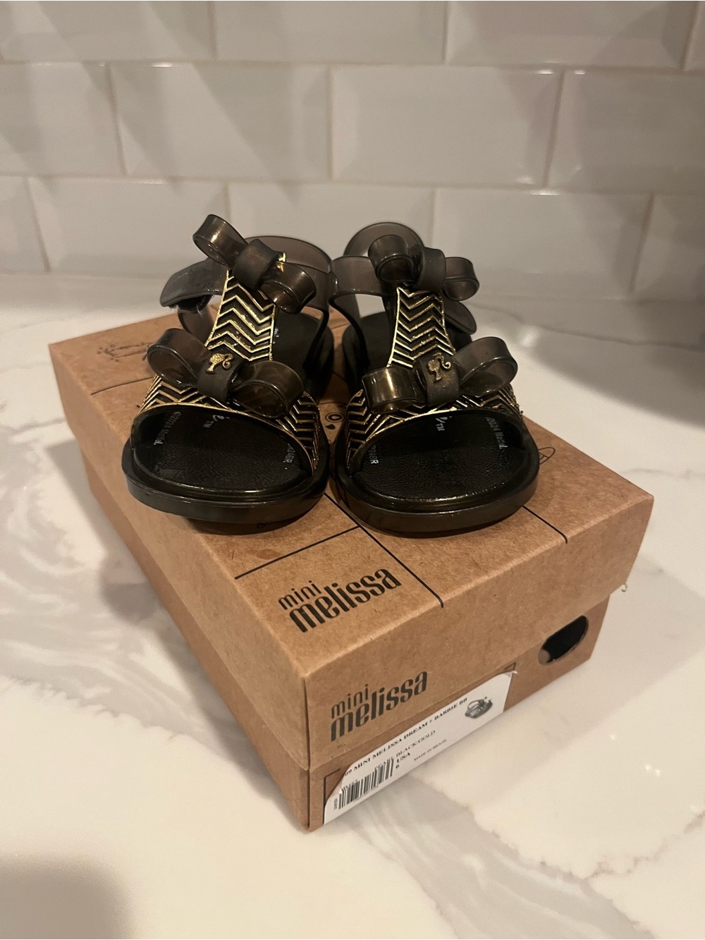 Mini Melissa Dream Barbie Pearl Black/ Gold Toddler Sandals, Size 6
